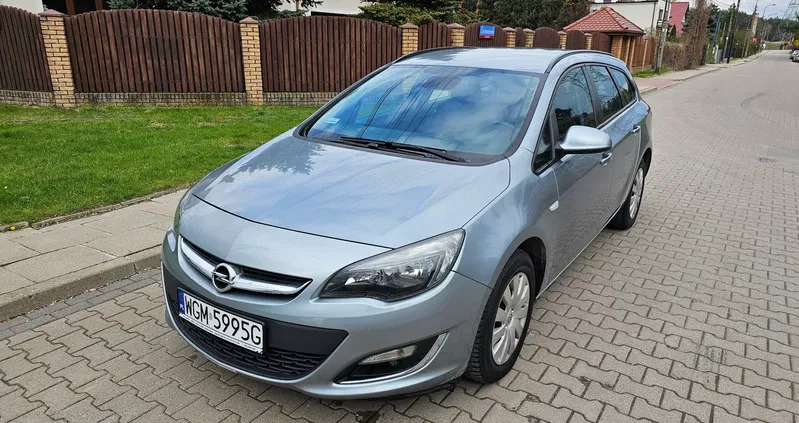 samochody osobowe Opel Astra cena 19900 przebieg: 241000, rok produkcji 2013 z Libiąż